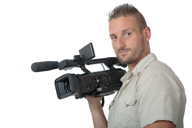 Man with professional camcorder isolated on white 