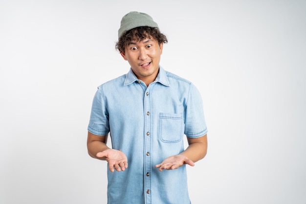 Man with questioning expression on isolated background