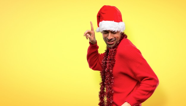 Man with red clothes celebrating the Christmas holidays enjoy dancing 