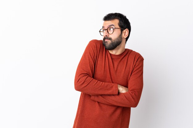 Man with red sweater posing