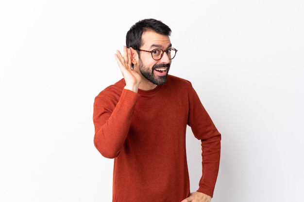 Man with red sweater posing