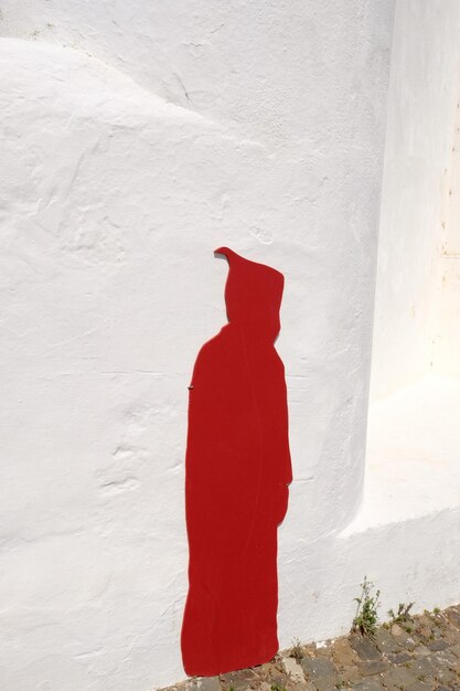 Man with red umbrella