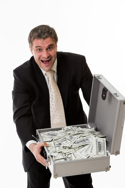 Man with suitcase full of money happy boss with a suitcase full of dollars