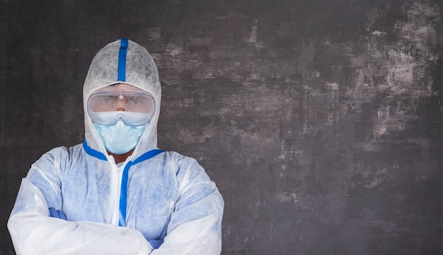 Man with, surgical mask and latex gloves