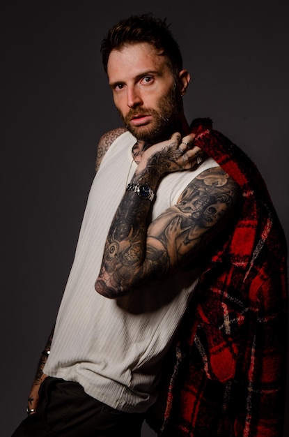 Premium Photo | A man with a tattoo on his arm