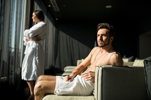 Man with a towel in a room