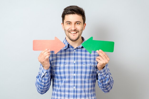 Man with two arrows pointing to the right and left