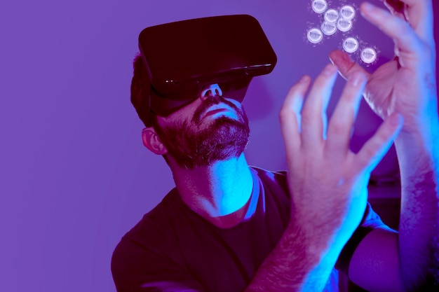 Man with vr glasses receiving nft in the metaverse