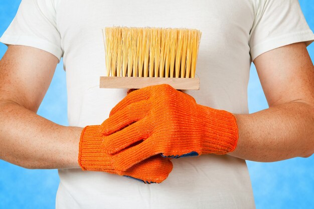 Man with wallpaper brush house improvement