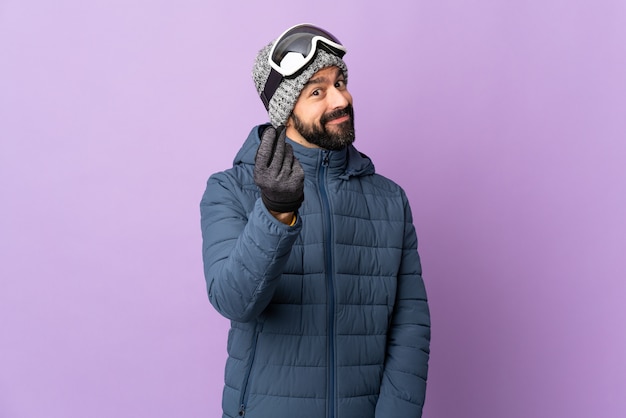 Man with winter clothes in studio