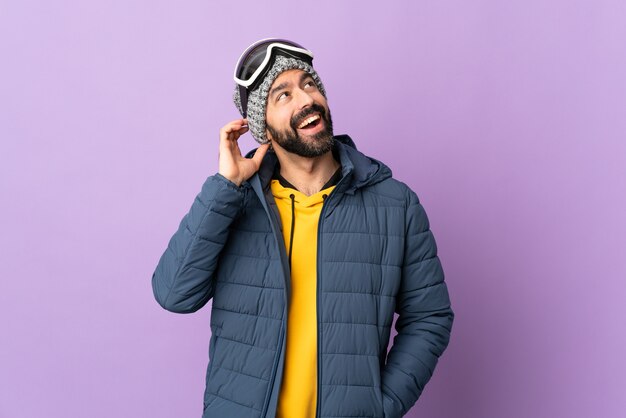 Man with winter clothes in studio