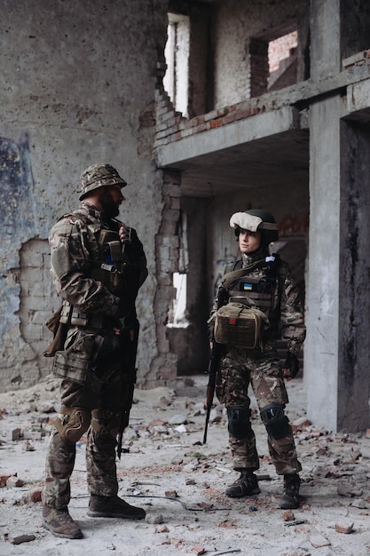 A man and a woman are brothers in armsxADefenders of Ukraine in the war zone