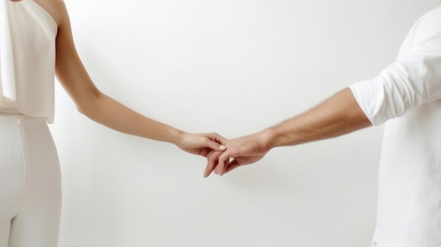 A man and woman are holding hands, one of them is touching.