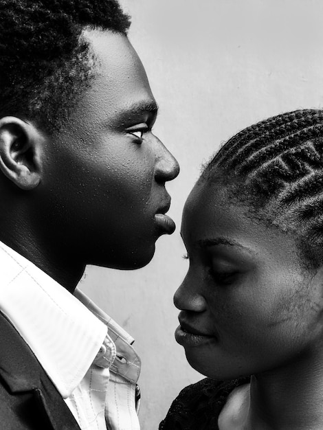 A man and a woman are looking at each other.