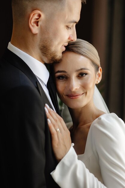 a man and woman are posing for a photo