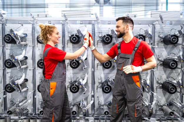 a man and woman are shaking hands with a woman