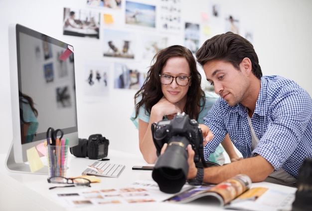 Man woman or camera for workshop photography with teamwork lens and creative editor in workplace People photographer and collaboration in career technology or focus in office on digital graphic