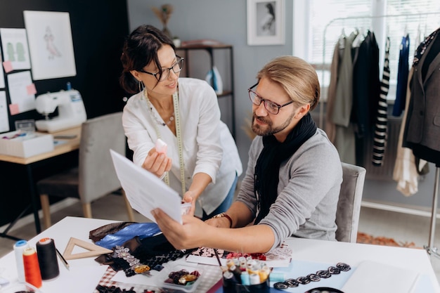 Man and woman creating clothes