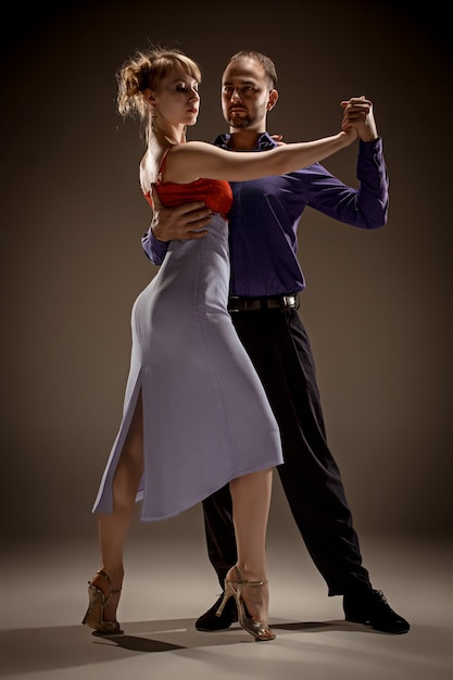 The man and the woman dancing argentinian tango