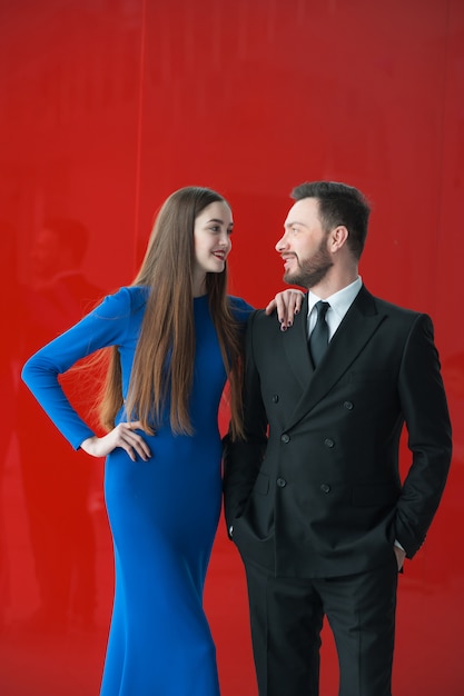 Man and woman in evening dresses