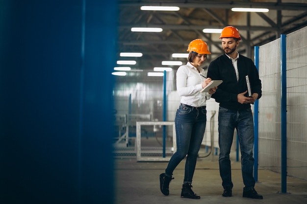 Man and woman at a factory