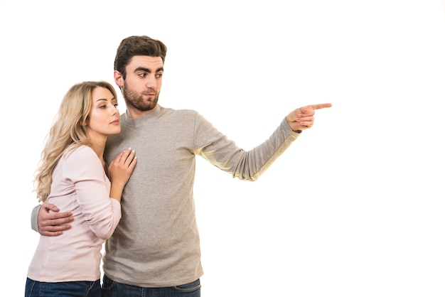 The man and a woman gesture on the white background