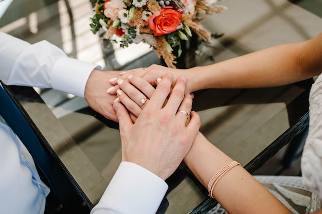 Man and woman hold hands