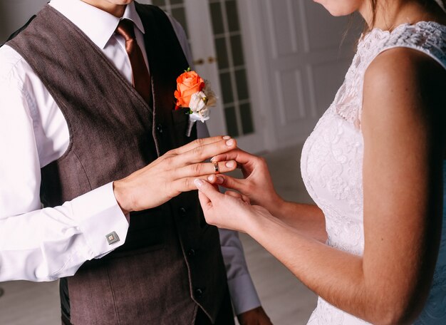 Man and woman holding a flower