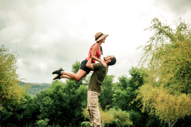 Man and woman jumping for photography