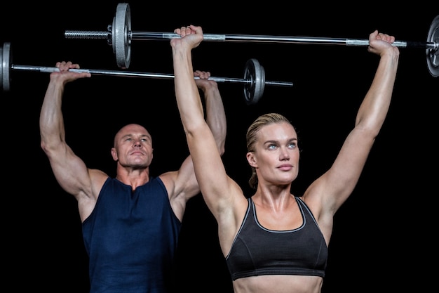 Man and woman lifting crossfit