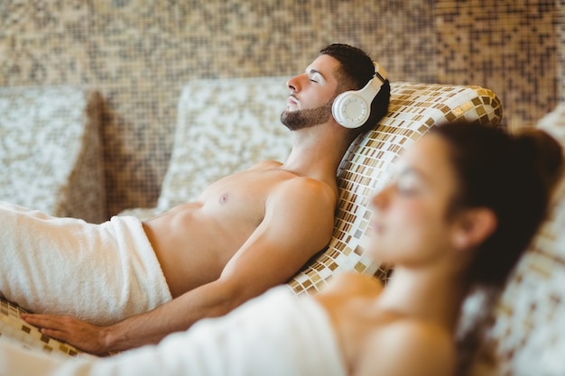 Man and woman lying down together