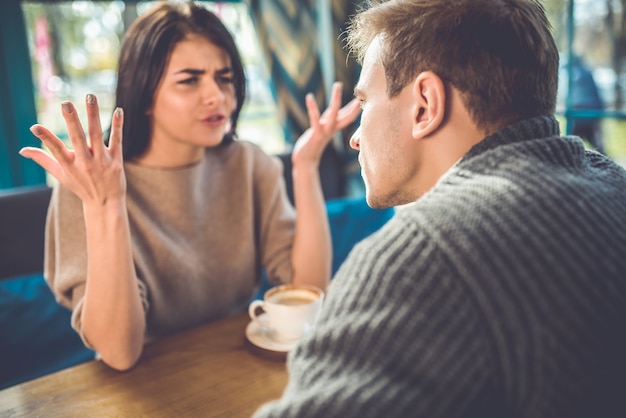 The man and woman quarreling in the restaurant