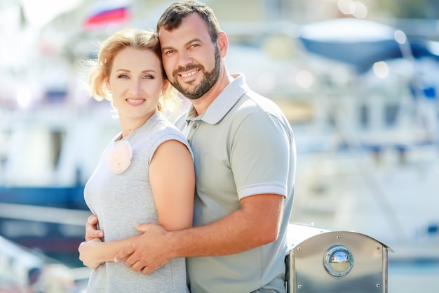 Man and woman on romantic trip cuddle together