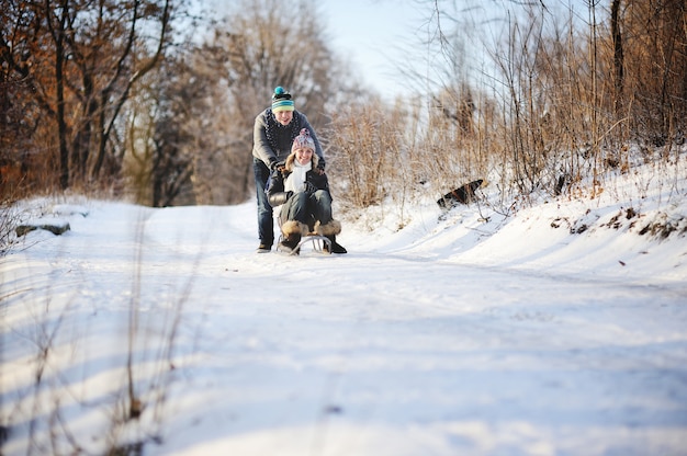 Man and woman on a sled