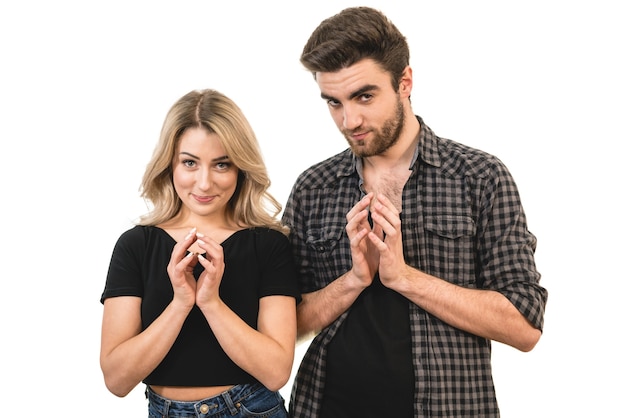 The man and woman stand on the white background