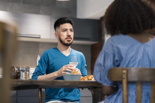 Man and woman talking with a smile