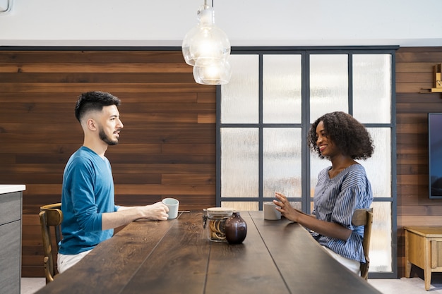 Man and woman talking with a smile