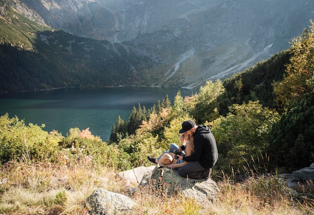 Man and woman travel together Romantic traveler couple watching beautiful landscape