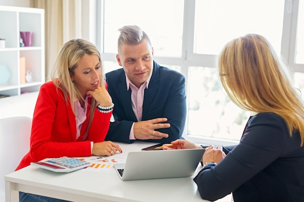 Photo man and woman visiting financial adviser