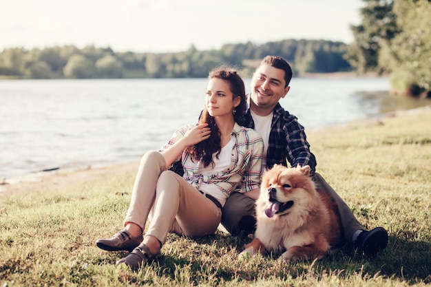 Man and woman with chow chow dog 