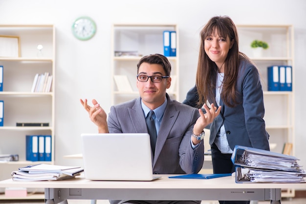 Man and woman working in the office