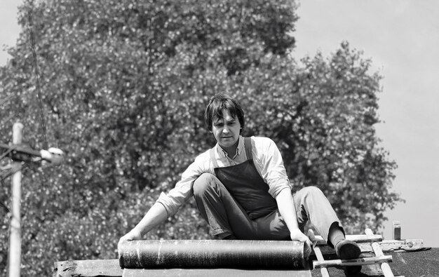 Man in worker's clothes at construction site