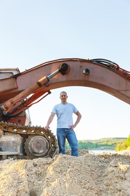 Man working  about construction equipment