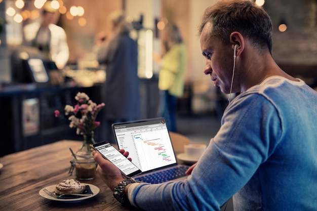 Man working in cafe