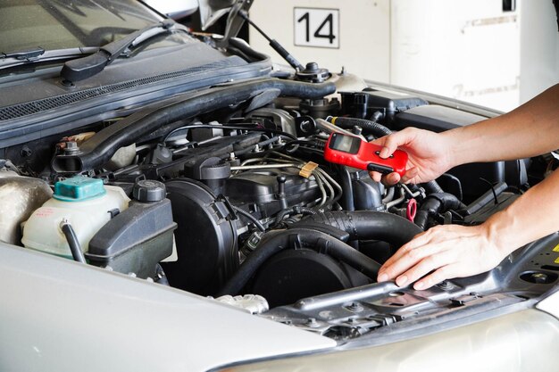 Photo man working in car