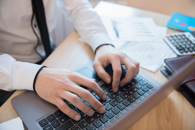 Man working in computer on the deskxA