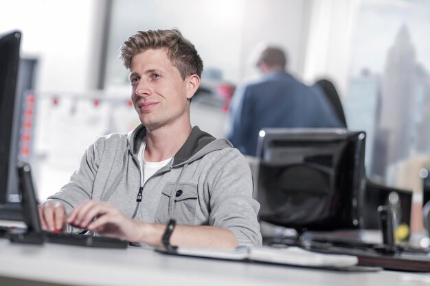 Man working on computer in office