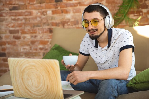 Man working from home during coronavirus or COVID-19 quarantine