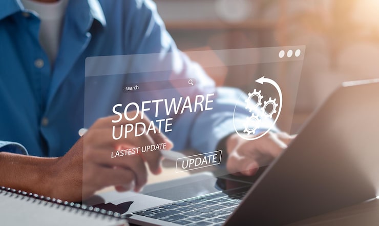 Photo man working and installing update process software updates or operating system upgrades to keep your device up to date with enhanced functionality in new versions and improved security