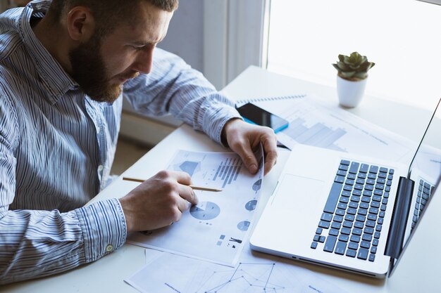 Man working on laptop computer